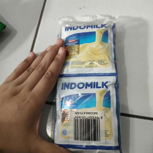 indomilk putih rtg isi 7