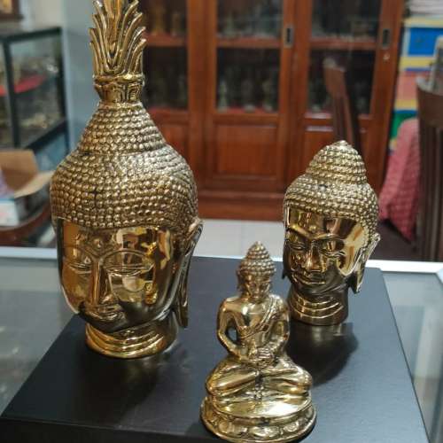 Kepala budha cor kuningan